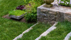 Stone steps and stone wall in landscaping