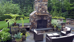 Patio and outdoor fireplace with garden furniture